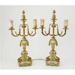 A pair of 19th century French neoclassical design 2-branch candelabra, the arms cast with ormolu...