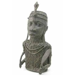 A bronze model of a warrior king, (ONIS), Nigeria, cast with a stylized Pangolin dress and ceremo...