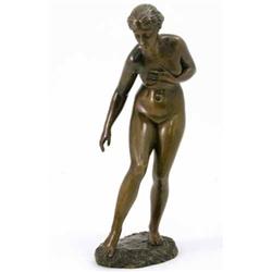 Barillot, a French bronze figure of a female nude, about to bathe, naturalistically modelled, imp...