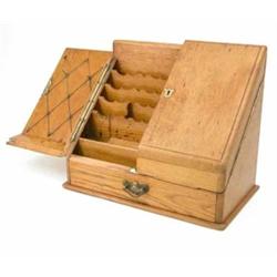 A Victorian light oak stationary box, the twin doors enclosing a compartmented interior, on plint...