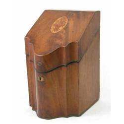 A George III serpentine mahogany knife box, with satinwood stringing and inlaid floral medallion,...