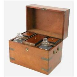 A Regency mahogany brass bound campaign tea chest, the hinged lid enclosing a compartmented inter...