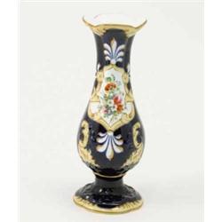 An early Victorian bone china vase, baluster shape with floral-painted reserve against a deep blu...