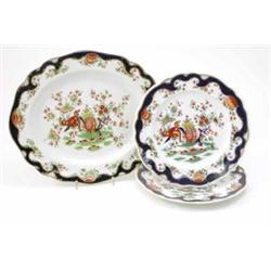 A Victorian Royal Worcester oval serving dish, printed and enamelled with a peony garden (14in.)...