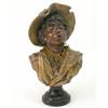 Image 1 : A painted composition bust of a boy, negro character wearing hat and loose-fitting jacket, on bla...