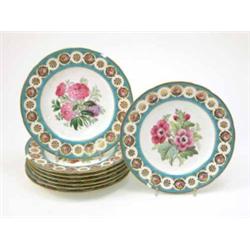 A set of eight Victorian Minton bone china plates, each painted with a different bouquet of flowe...