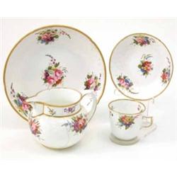 An early 19th century Spode part tea service, eighteen pieces including milk jug and saucer dish,...