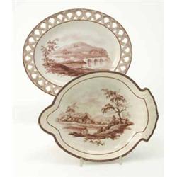 Two Wedgwood dessert dishes, one oval with pierced border, the other lobed oval, both painted wit...