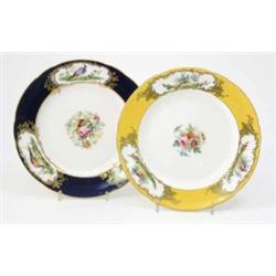 Two Mintons dessert plates, painted with bird vignettes, one against a yellow border, the other a...
