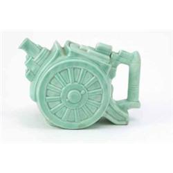 A G. Clews & Co. novelty teapot in the form of an artillery gun, glazed in green monochrome, prin...