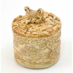 A Japanese ivory pot, carved with a bird finial and carp in a pond, 3ins...
