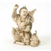 Image 1 : A Japanese carved ivory group of a man startled by a snake chasing a toad, signed, 4ins...