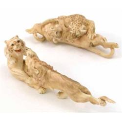 A Japanese ivory group of a fighting lion and tiger, 5ins and a similar group of a lion and leopa...