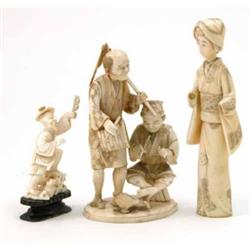 A Japanese ivory group of two farmers, 5.5ins and 2.5ins and a sectional figure, 6ins...