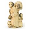 Image 1 : A Japanese marine ivory group of two monkeys carrying three skulls, signed 4ins...