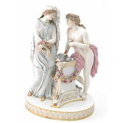 A 19th century Meissen figure group, classical scene of two ladies, one with wreath, other with t...