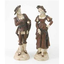 A pair of 19th German porcelain figures, of lady and gallant, in traditional dress, 14ins...