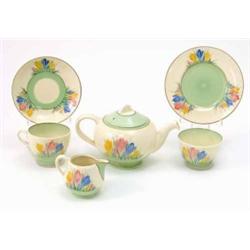 A Clarice Cliff 'Spring Crocus' teaset, eleven pieces including teapot, milk jug and sugar bowl,...