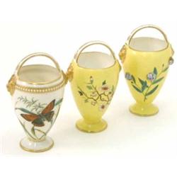 Two Victorian Royal Worcester baskets, with floral decoration against a yellow ground (5in.) and...