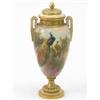 Image 1 : A Royal Worcester two-handled vase and cover, painted with peacocks and shrubs in bright enamels,...