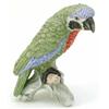 Image 1 : A Goebel bisque porcelain parrot, painted in green, blue and red, perched upon branch, impressed...