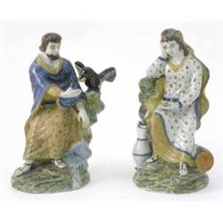 A pair of 18th century Prattware figures of Elijah and Widow, seated Elijah with raven, widow bes...