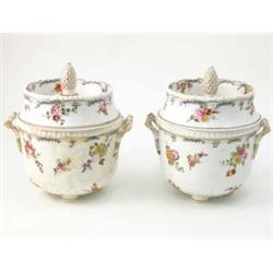 A pair of early 19th century Staffordshire porcelain ice pails and covers, with pineapple finials...