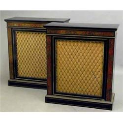 A pair of mid 19th century ebonised and boulle pier cabinets, with latticed grilles on plinth bas...