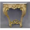 Image 1 : A mid 18th century giltwood console table, with later white marble top on a rococo base with scro...