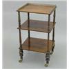 Image 1 : A Regency rosewood three tier whatnot, replaced gilt brass gallery and turned supports on toupie...