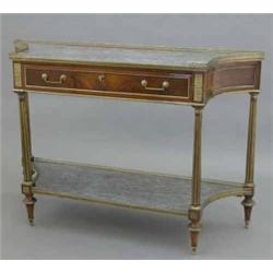 A late 19th century French mahogany and brass mounted serving table, with grey marble top and und...