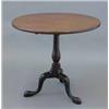 Image 1 : A George III mahogany circular occasional table, on baluster stem with tripod, 2ft 7ins...