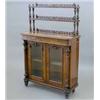 Image 1 : A Victorian walnut chiffonier, with double open shelf back over two glazed doors flanked by spira...