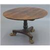 Image 1 : A Regency rosewood and string inlaid circular breakfast table, on turned stem and triform base fi...