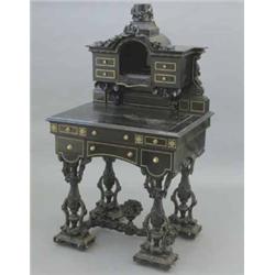 A Louis Philippe ebonised bonheur du jour, with superstructure of small drawers and pull out lett...