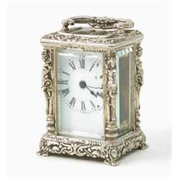 A silver plated 'mignonette' carriage timepiece, with compensated balance and enamelled dial, in...