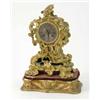 Image 1 : A 19th century French ormolu mantel clock, with rococo scroll case and silvered Roman dial, 11ins...