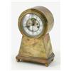 Image 1 : An American brass mantel clock, in escutcheon shaped case, with enamelled Arabic dial and visible...