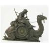Image 1 : An Austrian bronzed metal mantel timepiece, modelled as an Arab seated upon a camel, (later movem...