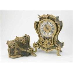 A 19th century Louis XV design boulle work mantel clock, with rococo scroll ormolu mounts and gil...