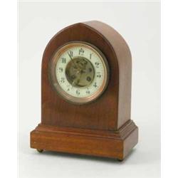 An Edwardian mahogany mantel clock, with lancet case and visible escapement, 12.5ins...