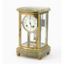 A French green onyx and gilt brass four glass mantel clock, with floral swagged Arabic dial and m...