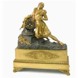 An early 19th century French bronze and ormolu clock case, surmounted with a fallen warrior, lack...
