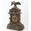 Image 1 : A Black Forest carved wood cuckoo mantel clock, surmounted with an eagle, 23ins...