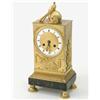 Image 1 : A Regence ormolu mantel clock, with rectangular case decorated with pastoral motifs of a lamb and...