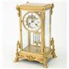 Image 1 : A French ormolu four glass mantel clock, with enamelled Roman dial, visible escapement and mercur...