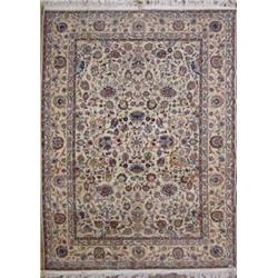 A Persian cream ground small carpet, the field all over woven with serrated edged foliage within...