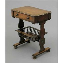 A Victorian mahogany work table, with gadrooned top and single drawer over a galleried tray on st...