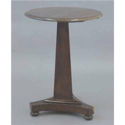 An early Victorian mahogany circular occasional table, with triangular stem and triform base with...