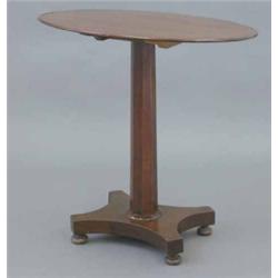An early Victorian oval top occasional table, on octagonal stem, platform and four bun feet, 2ft...